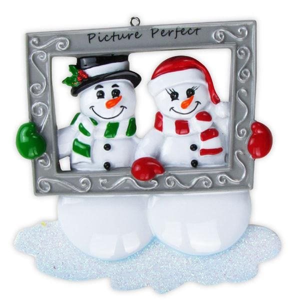 OR705- Snow Couple Holding Frame